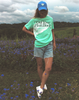Get Your Pink Back Feather Line Turquoise Tee