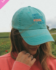 Get Your Pink Back Feather Line Green Dad Hat