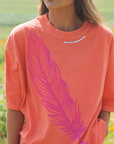 Get Your Pink Back Feather Line Red Tee