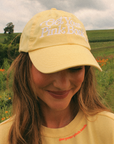 Get Your Pink Back Feather Line Yellow Dad Hat